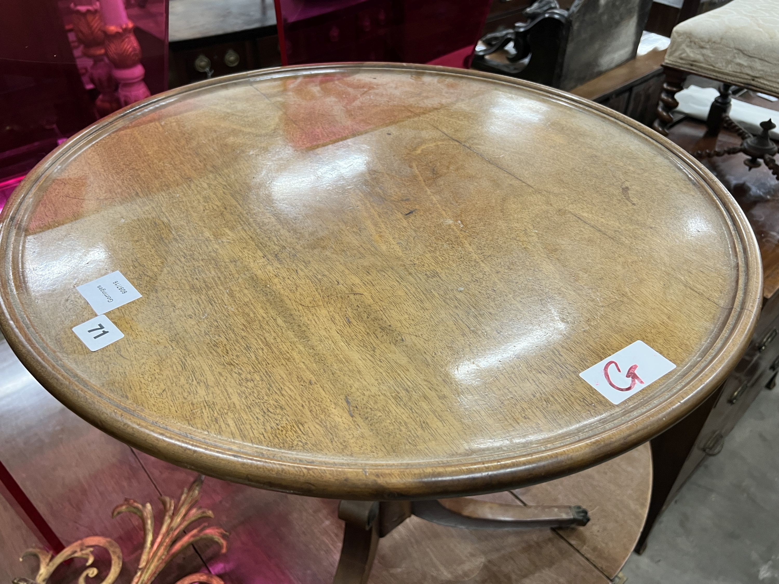 A Regency circular mahogany tilt top tripod tea table, diameter 63cm, height 71cm